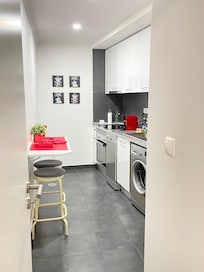 Super clean and efficient kitchen with all the needs addressed (coffee, tea, etc. detergents for dishwasher and laundry.