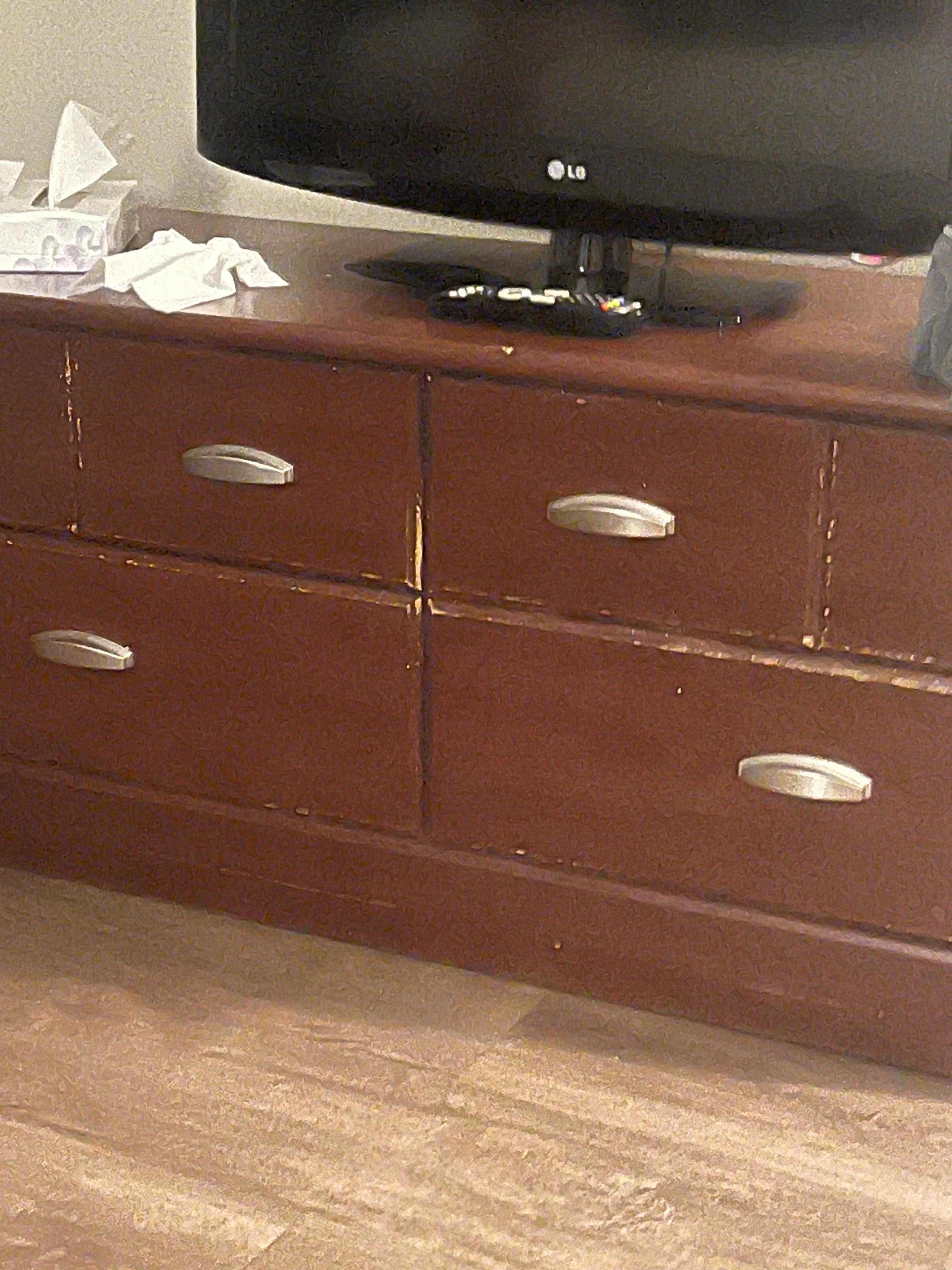 Wood chipped dresser 