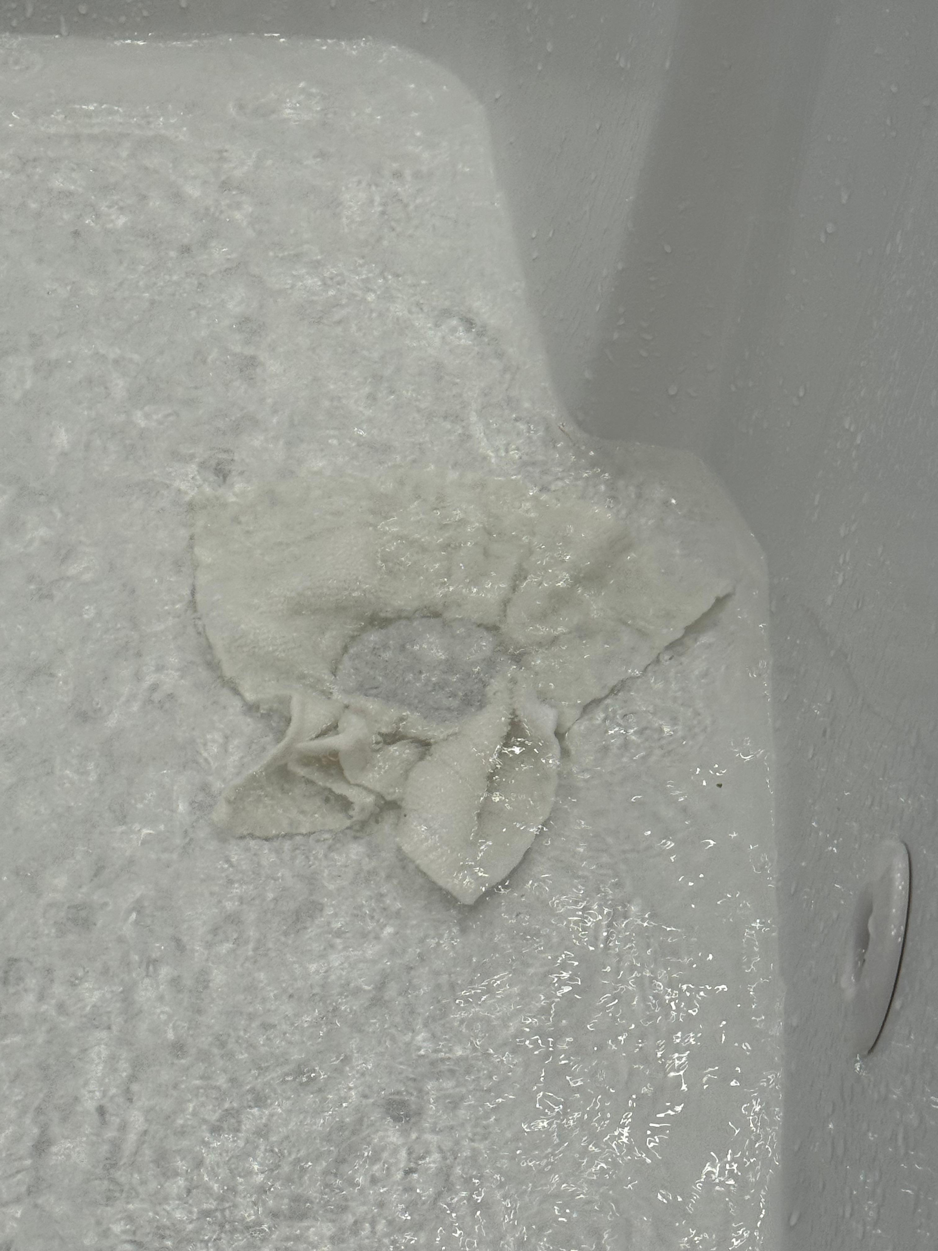 Jacuzzi drain plugged with washcloth