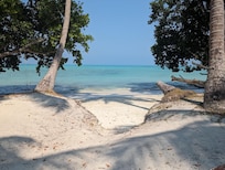 Tilar Siro beach at high tide, perfect for swimming.