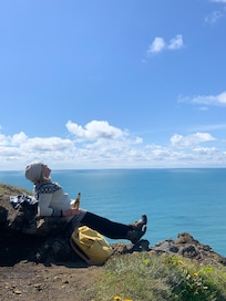 Opposite rock formation of black sand beach
