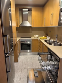 Kitchen.  The dishwasher was full of clean dishes when we arrived.