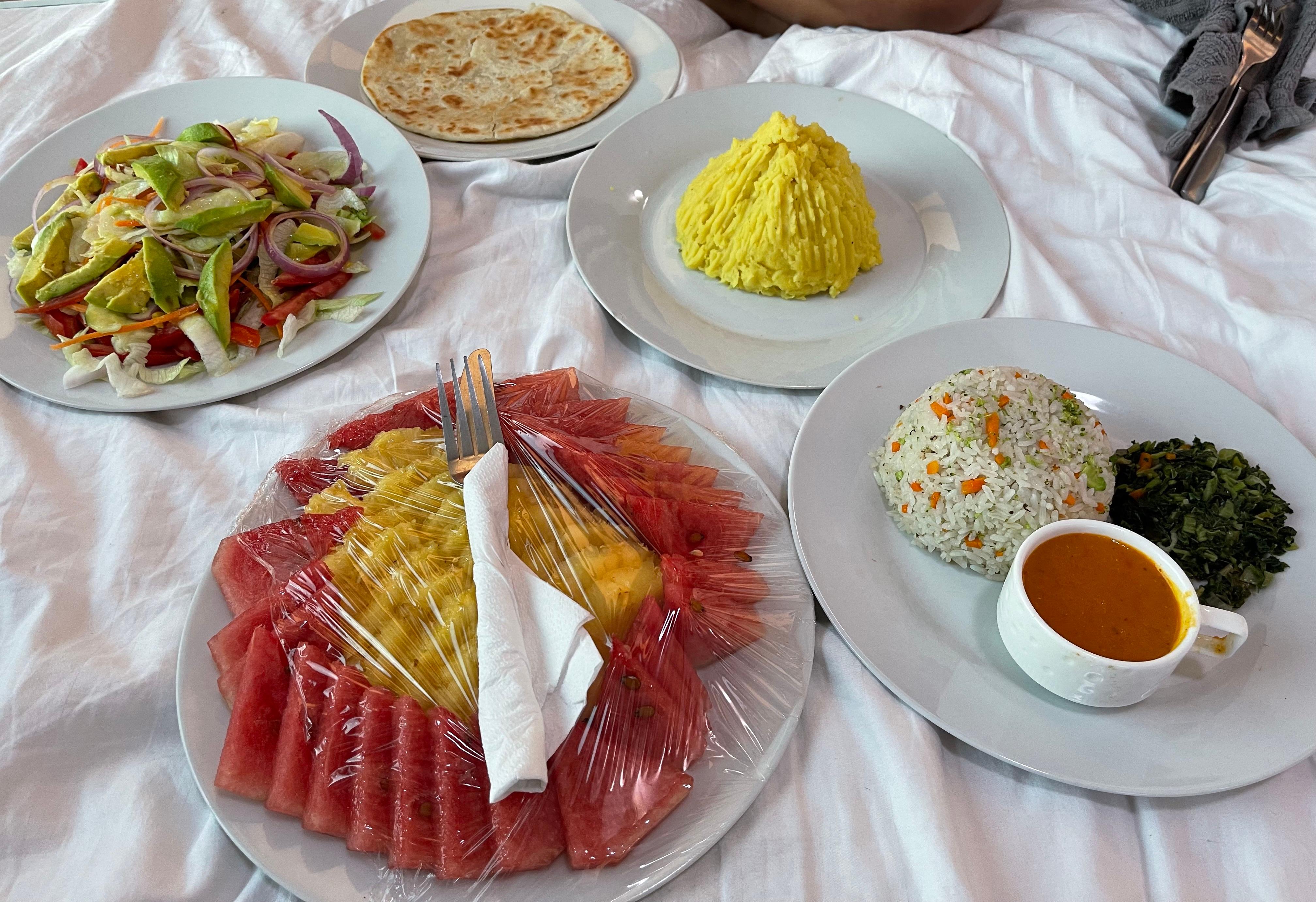 Room service - Avocado salad, fresh fruit platter, vegetable fried rice, mashed potato and chapati