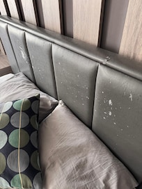 Scratched headboard.