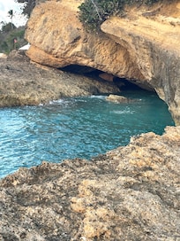 Rock cliff beside beach