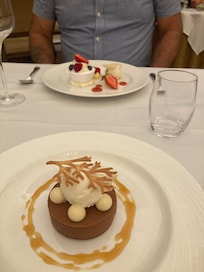 Dinner desserts.  Lemon pavlova and chocolate and ginger mouse