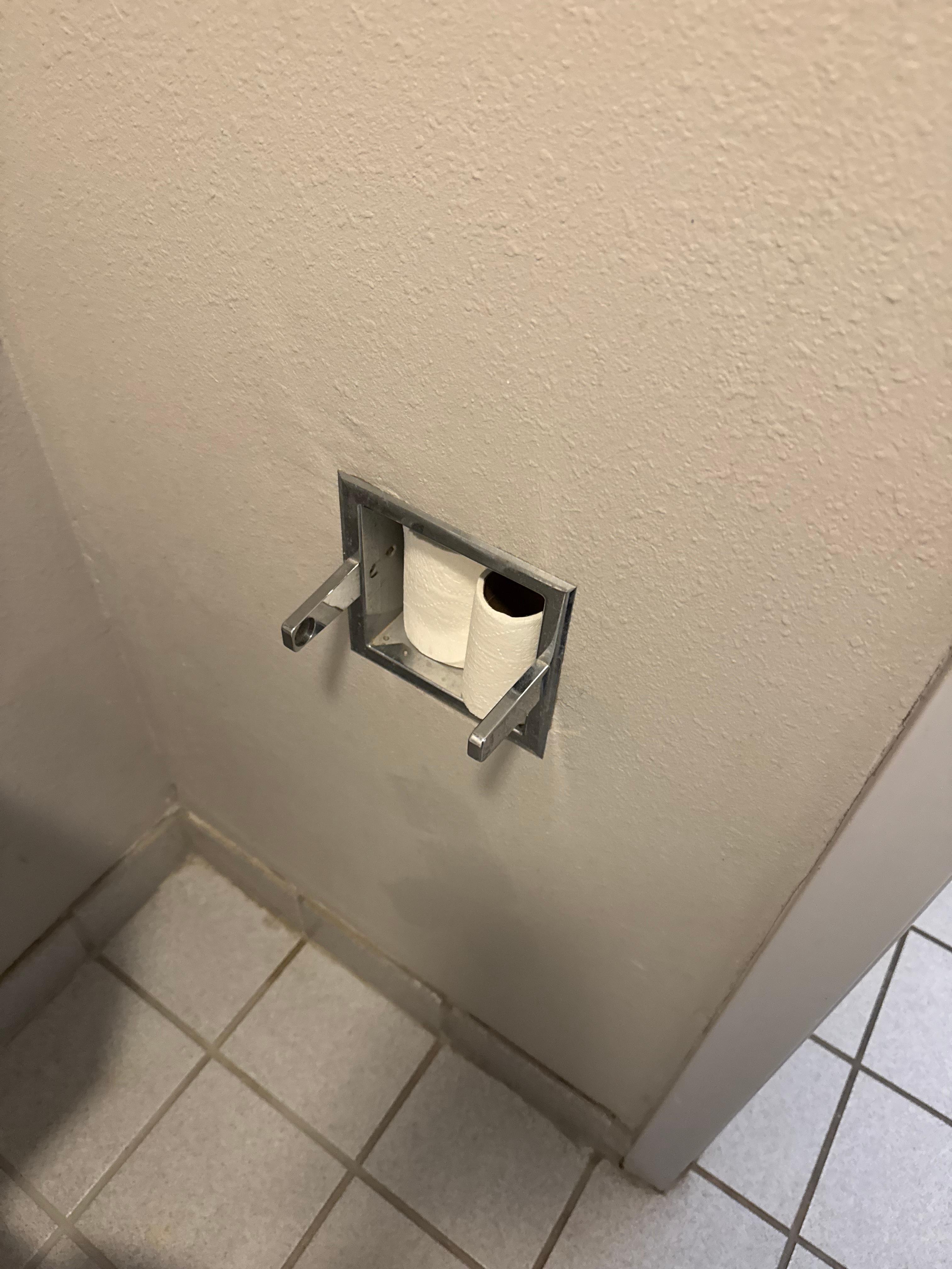 Missing TP holder and no extra rolls.