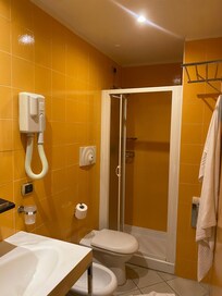 Our bathroom. You had to get in the shower and get wet to turn it on.