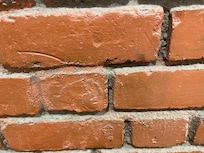 Closer look at the dust in the brick wall