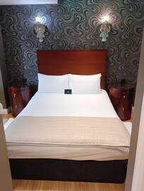 Comfy with plenty of pillows.