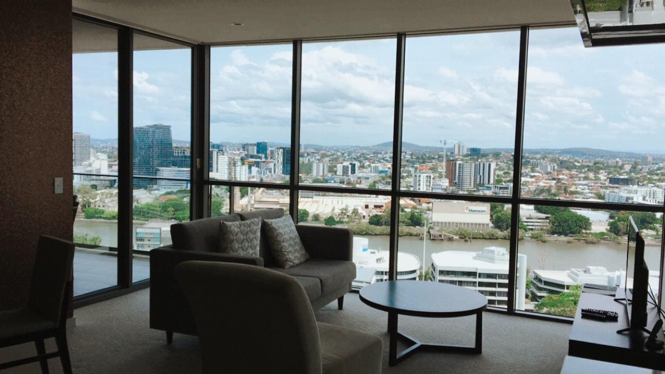 River view room with balcony connecting living room and bedroom