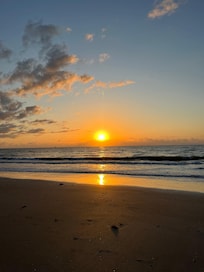 Sunrise on the beach outside Cocoa beach Towers