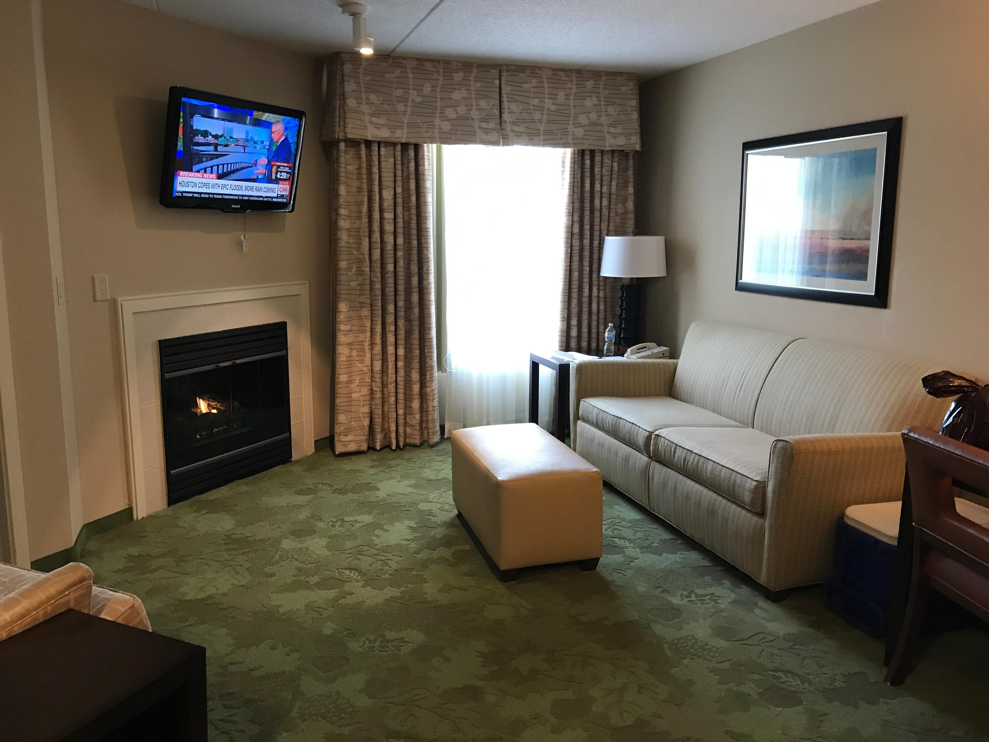 Cozy gas fireplace and nice quality HDTVs in living room and bedroom