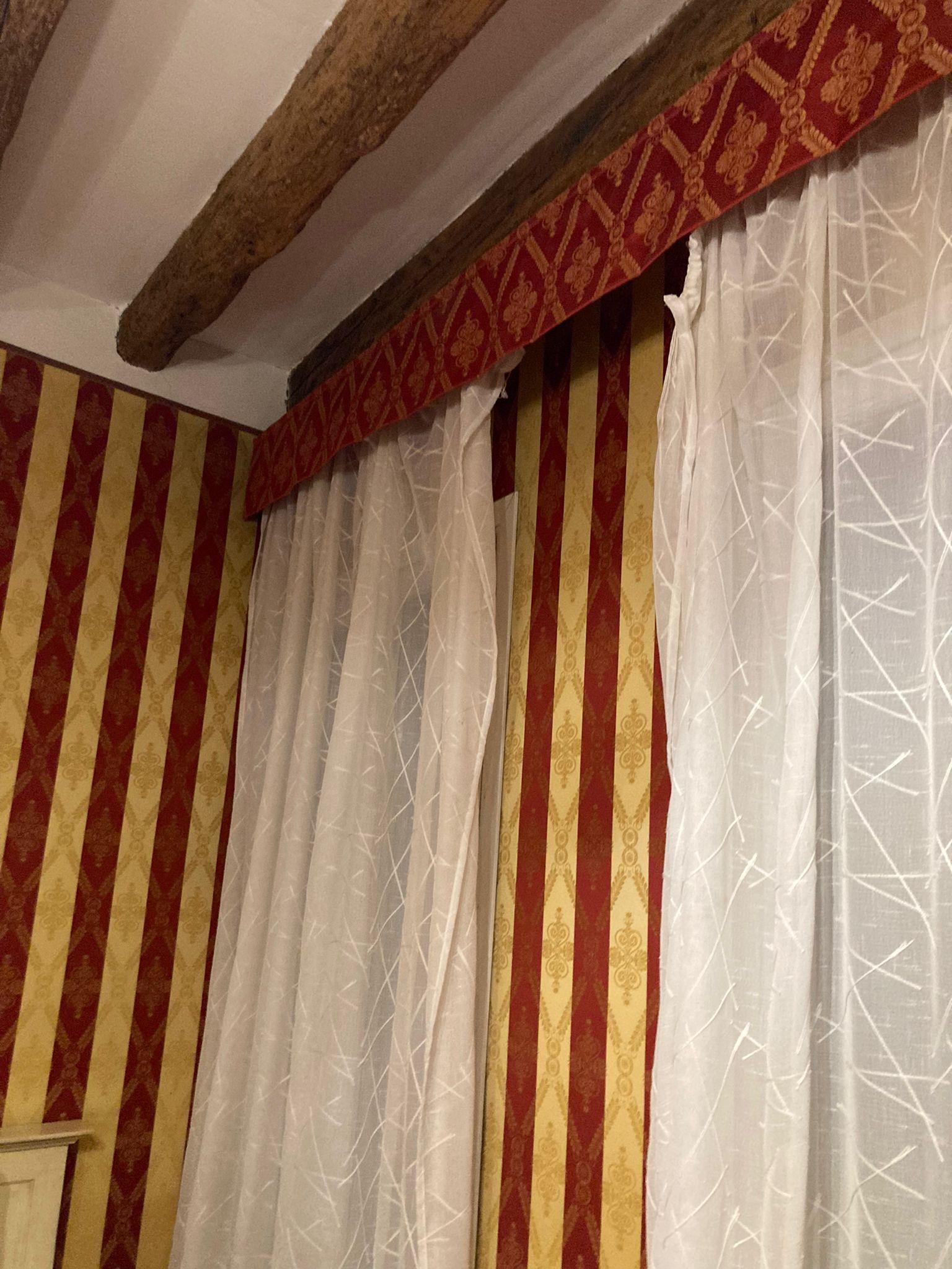 Net curtains falling off the rail 