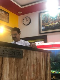 The manager. look at the clock.
Check in was at 12