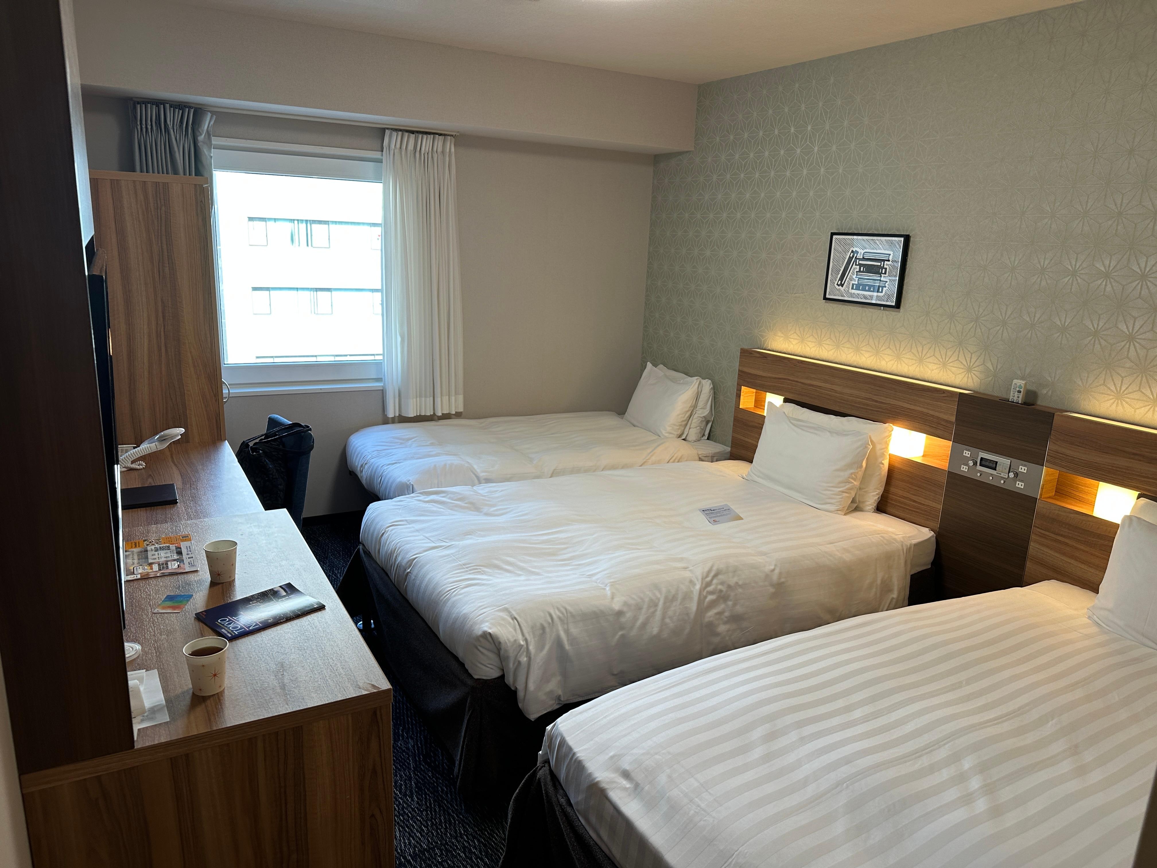 Chambre pour un couple et un enfant