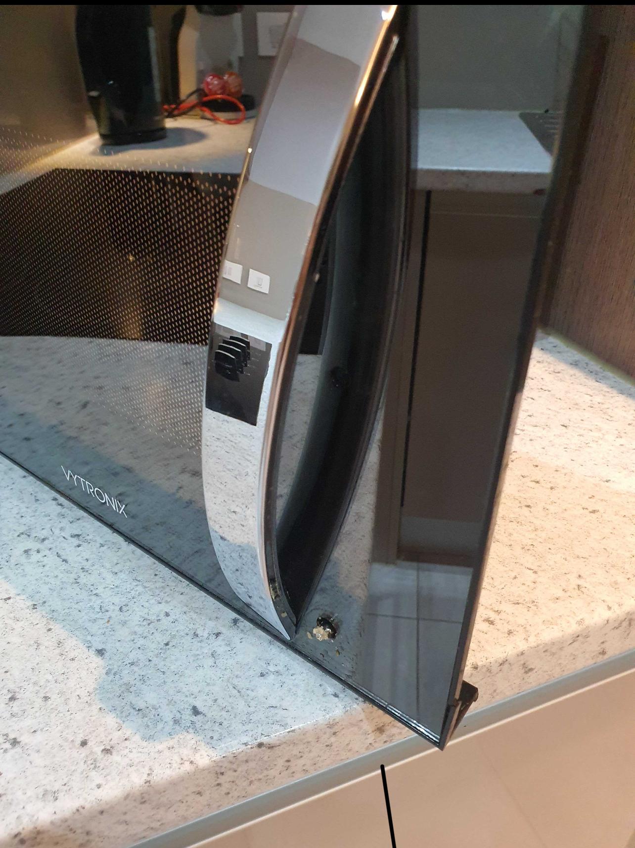 Microwave handle is ‘found’ broken by the cleaners