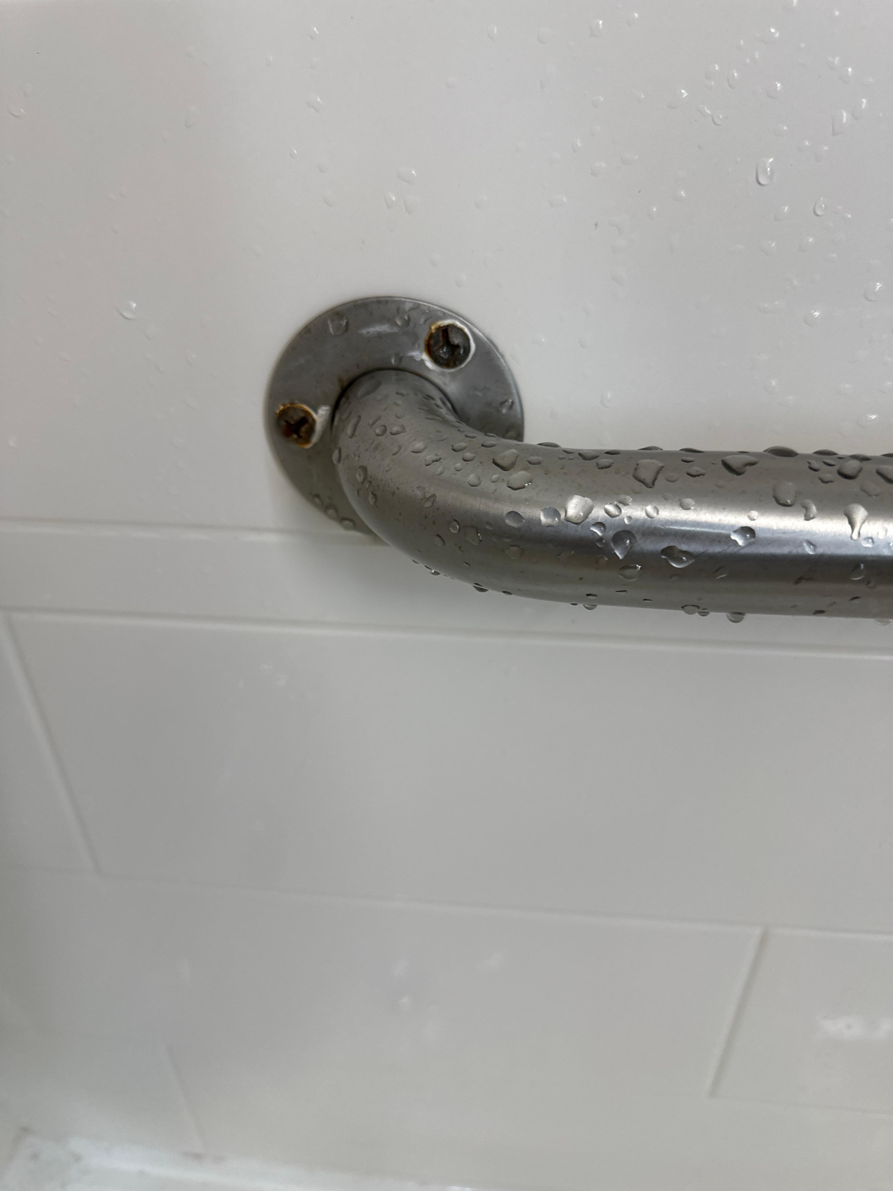 Stainless steel fasteners not used in shower area