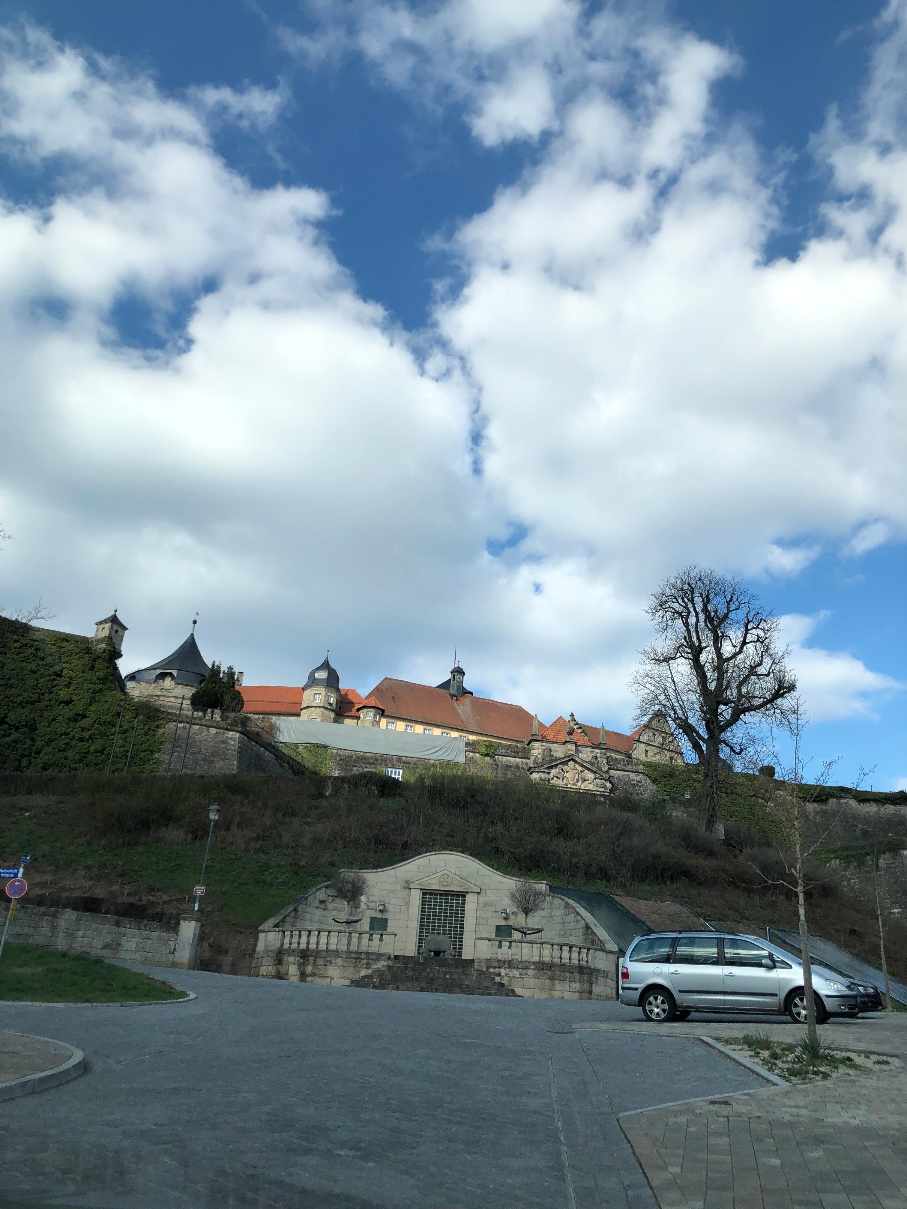 Bottom of road up to main gate 