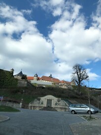 Bottom of road up to main gate