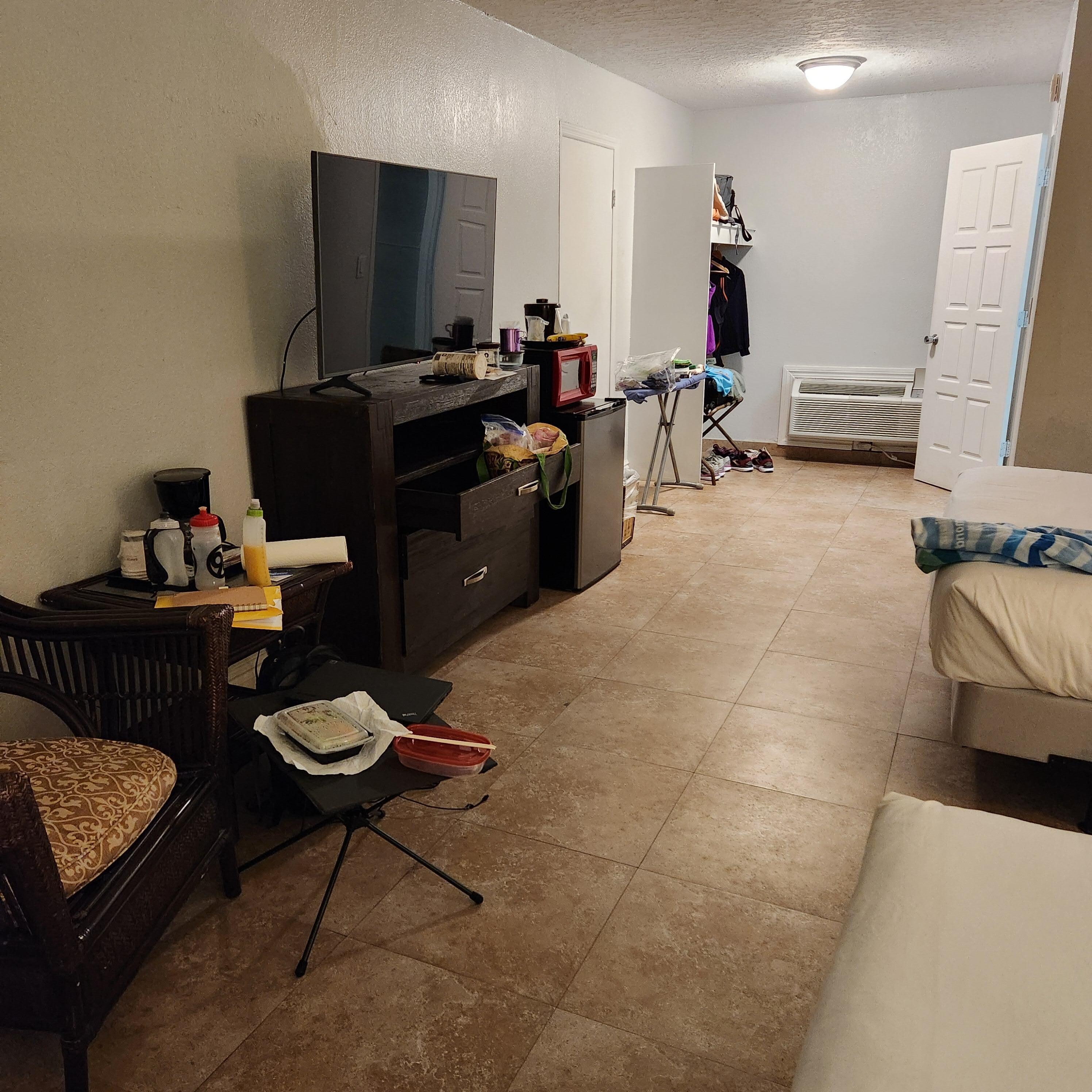Stayed for 3 nights. Added a camping table in front of the big chair (chair was not comfortable) and the ironing board - for space to put my stuff. Should replace big chair and small table with small desk and nice desk chair. Plus new mattresses.