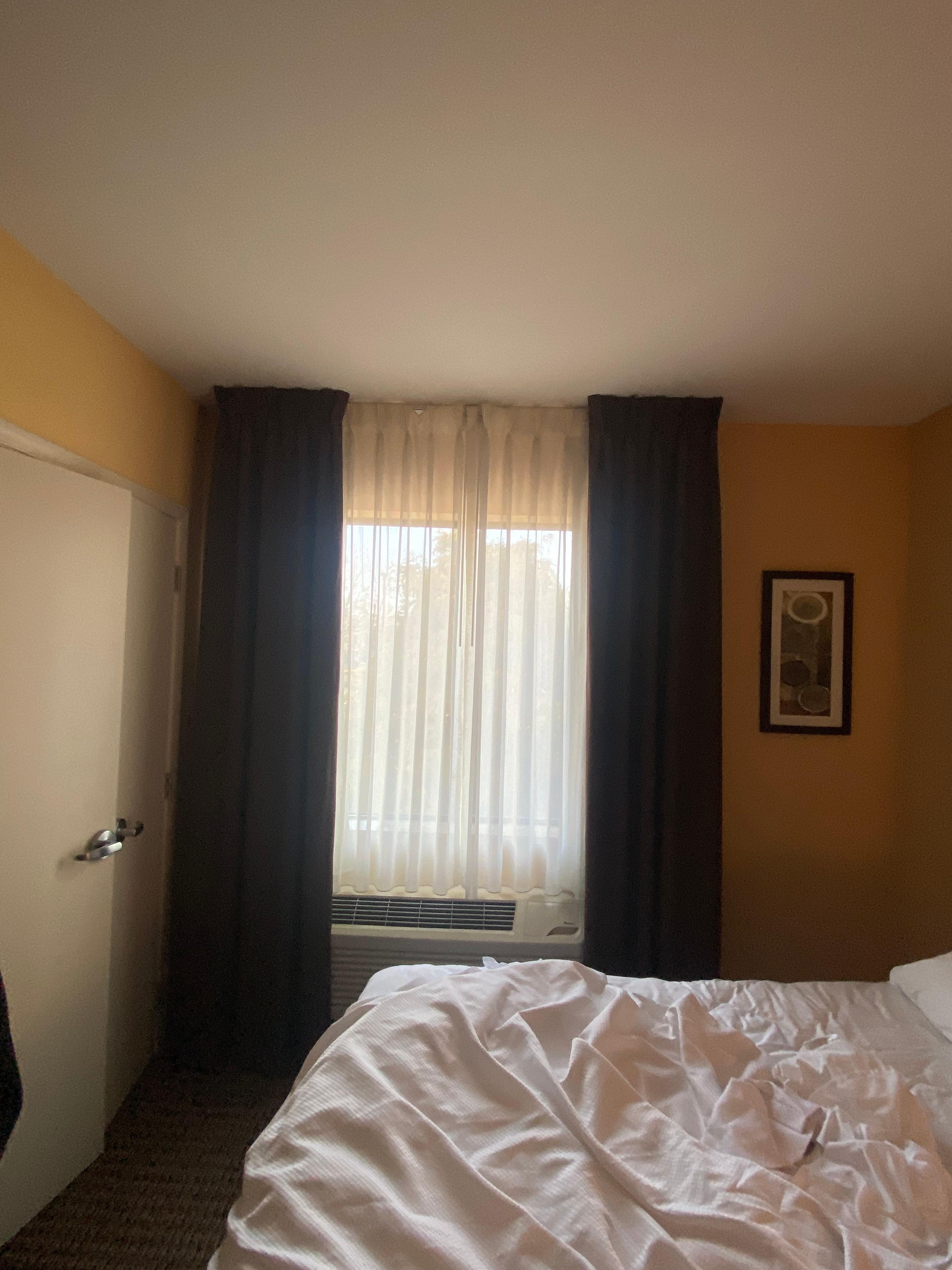 Privacy/room darkening curtains were not made to close all the way. 