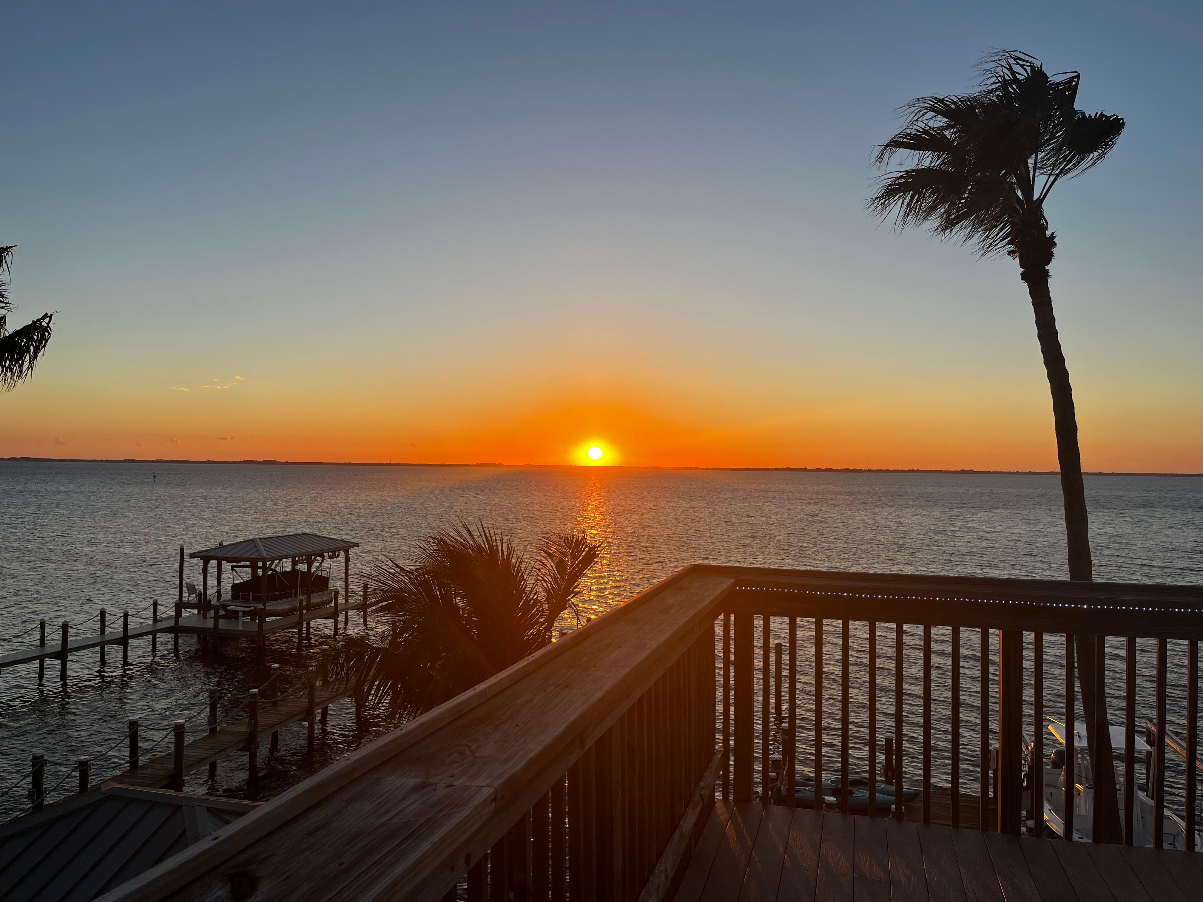 Sunset from the 3rd story rooftop deck! (There is even an elevator for people with mobility limitations, impressive for a small hotel)