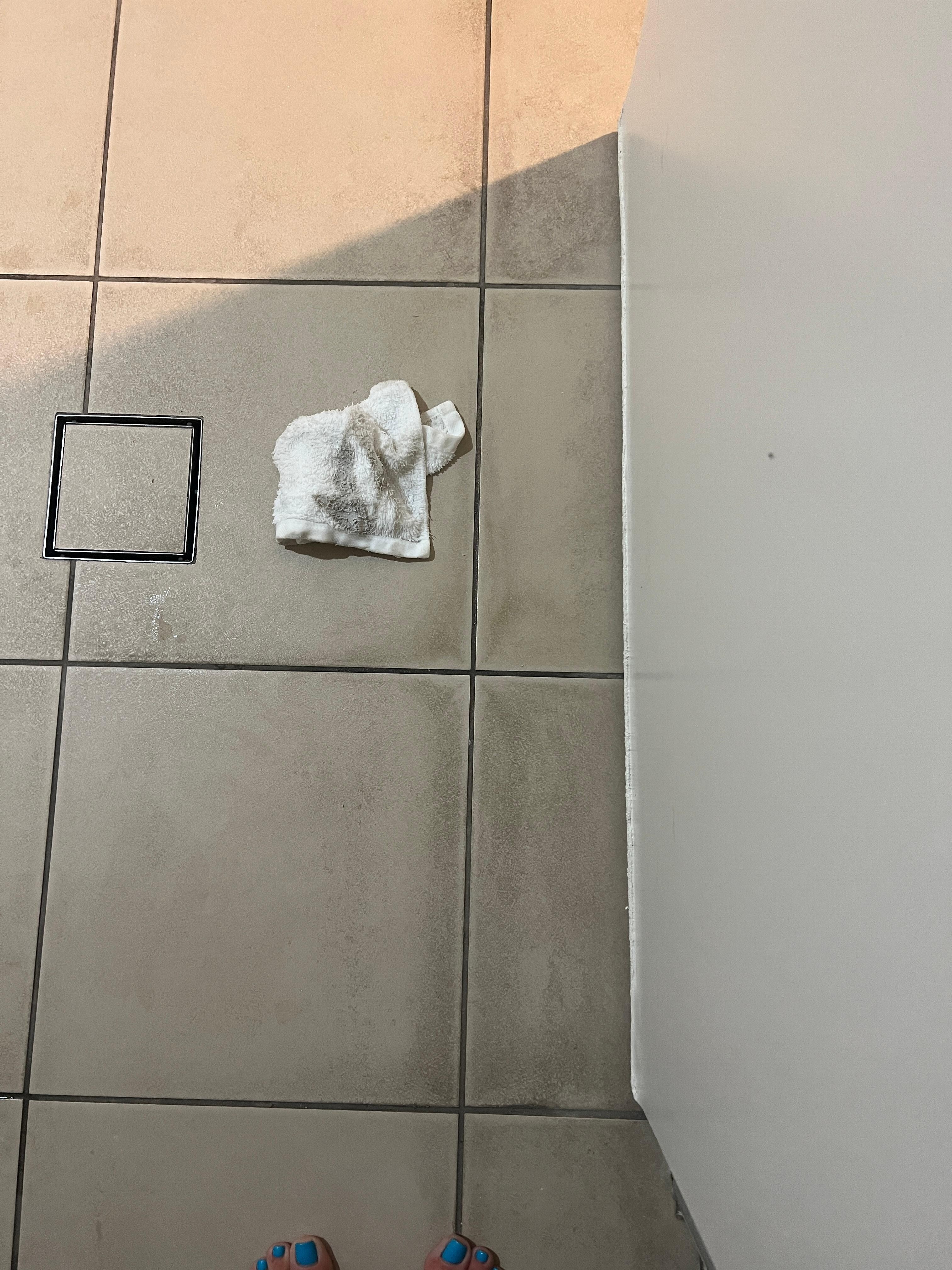 Dirt off just one half tile after I cleaned a section