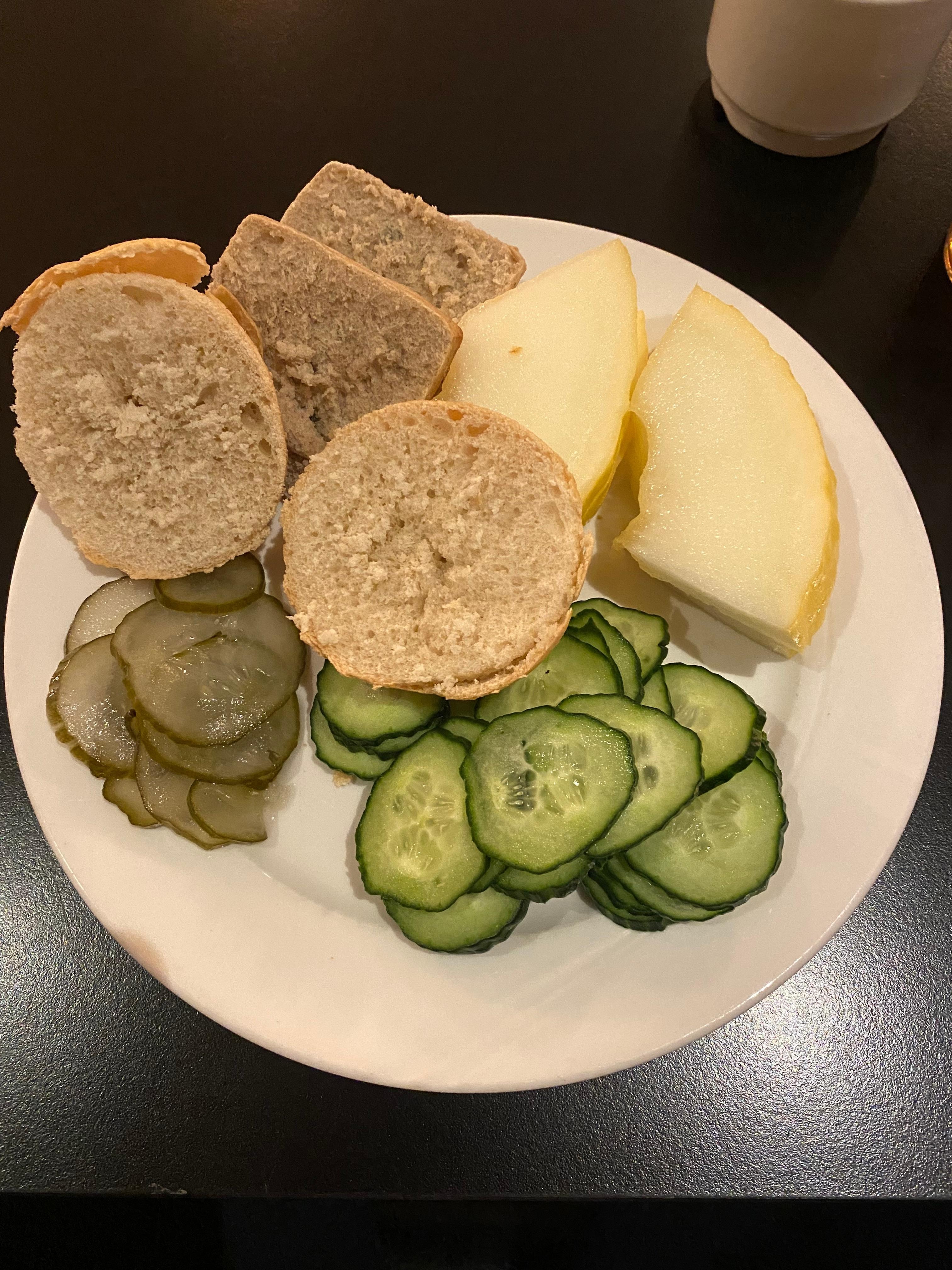 Dry bread, melon slices, cucumber and pickles. No other vegetables were available, not even margarine to put on the bread. The meat eaters had a full buffet complete with desserts.