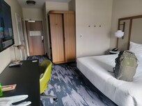 Walking out of the room.