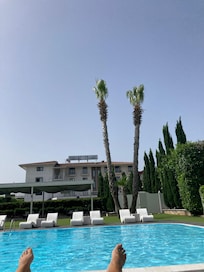 The pool Area overlooking the hotel. Amazing to spend our days here.