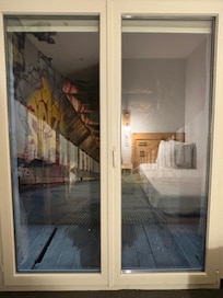 Chambre et reflet en trompe l’oeil