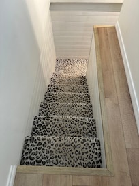 No stair rail and stairs are not level.