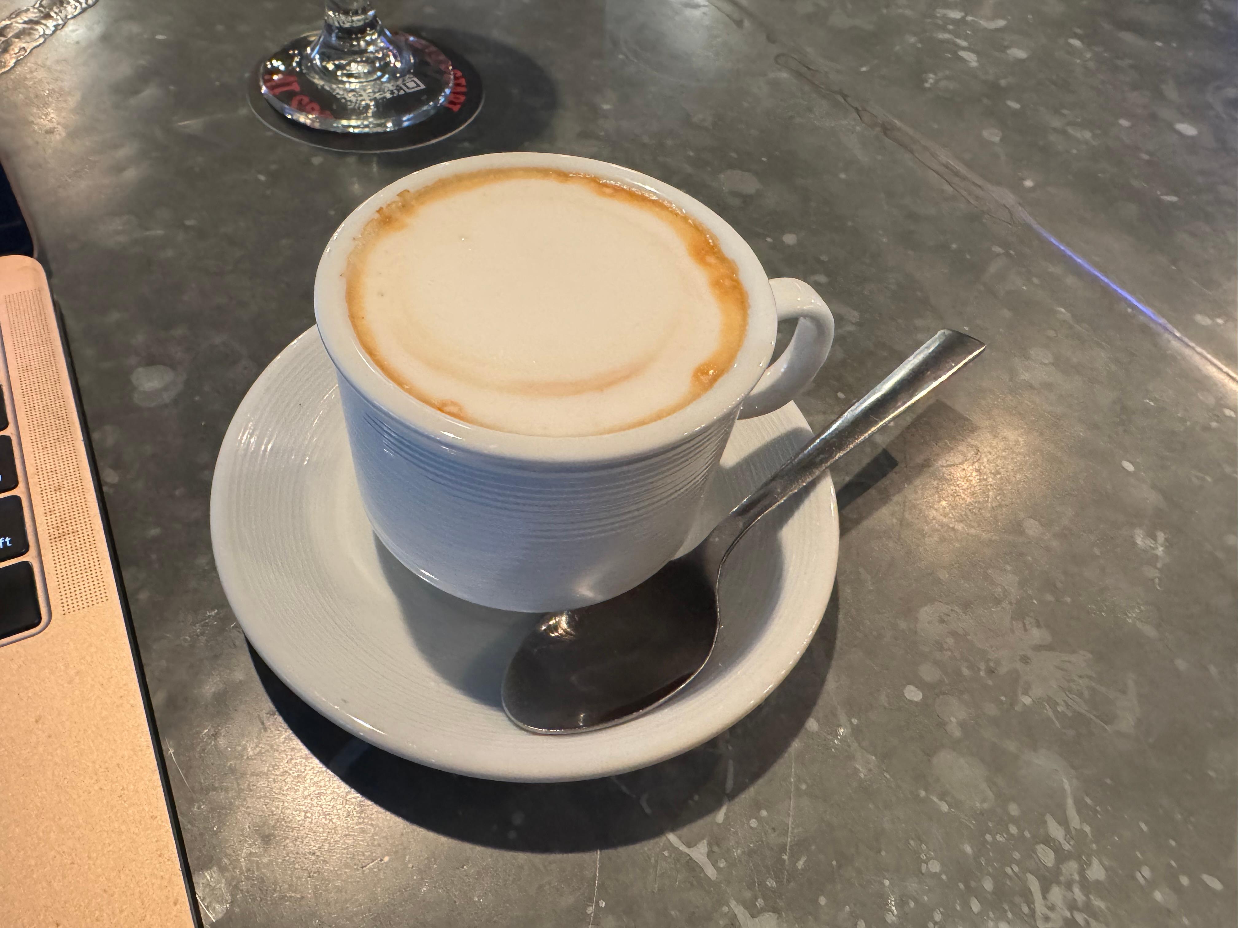 Delicious cappuccino at the bar.