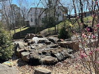 Water fall, and a fire pit and  generous parking and a place to walk  the dog.  It’s a dog friendly place to stay.