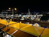 Photos taken from balcony. The gold roofs are restaurants with excellent fresh seafood dishes.