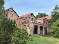 Swimming pool and restaurant terrace just above
