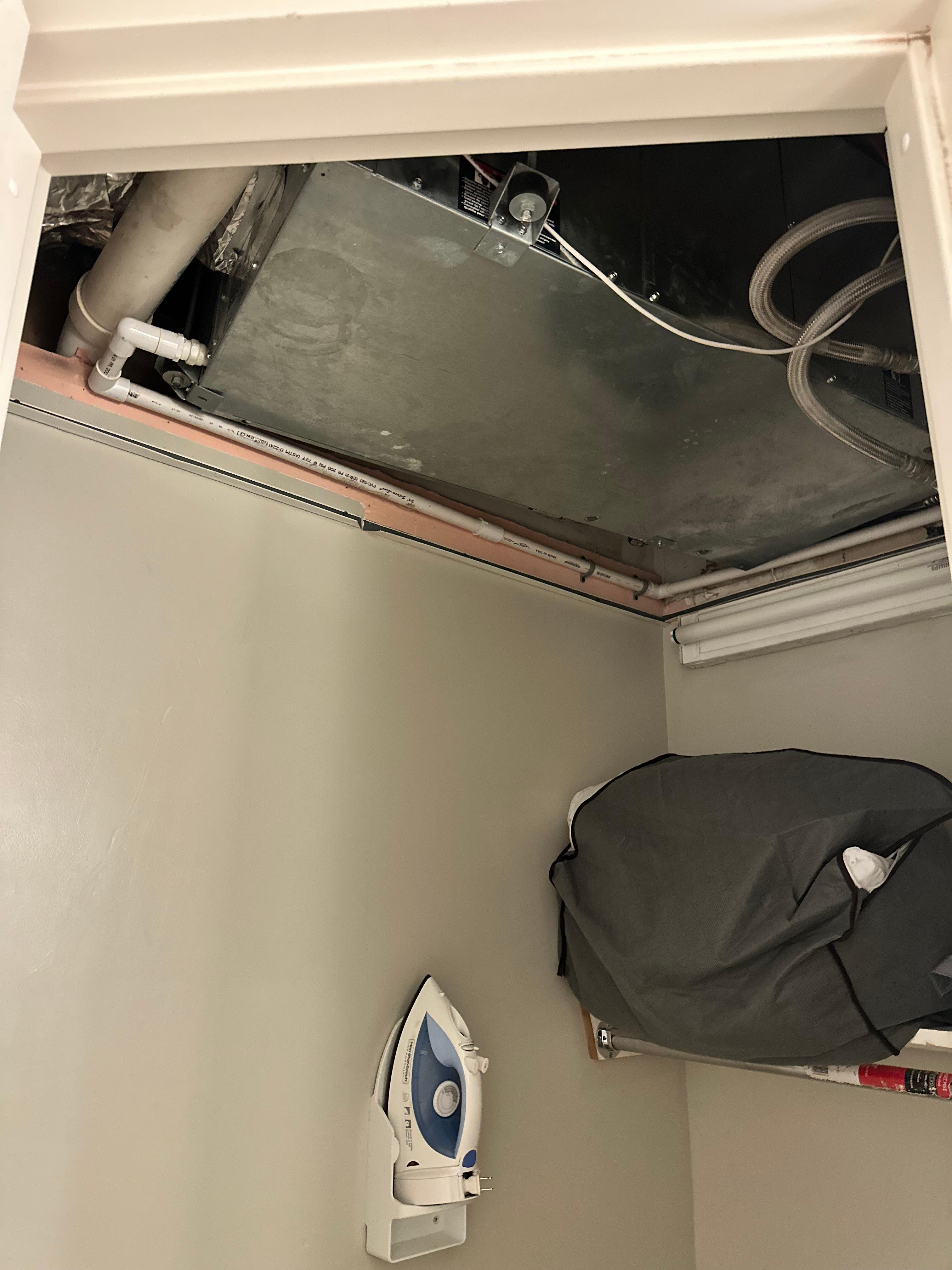 No ceiling in the closet could see all the mechanical equipment.