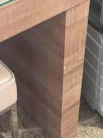Chipped furniture - all needs a bit of work to bring it up to standards one would expect for the money being spent.