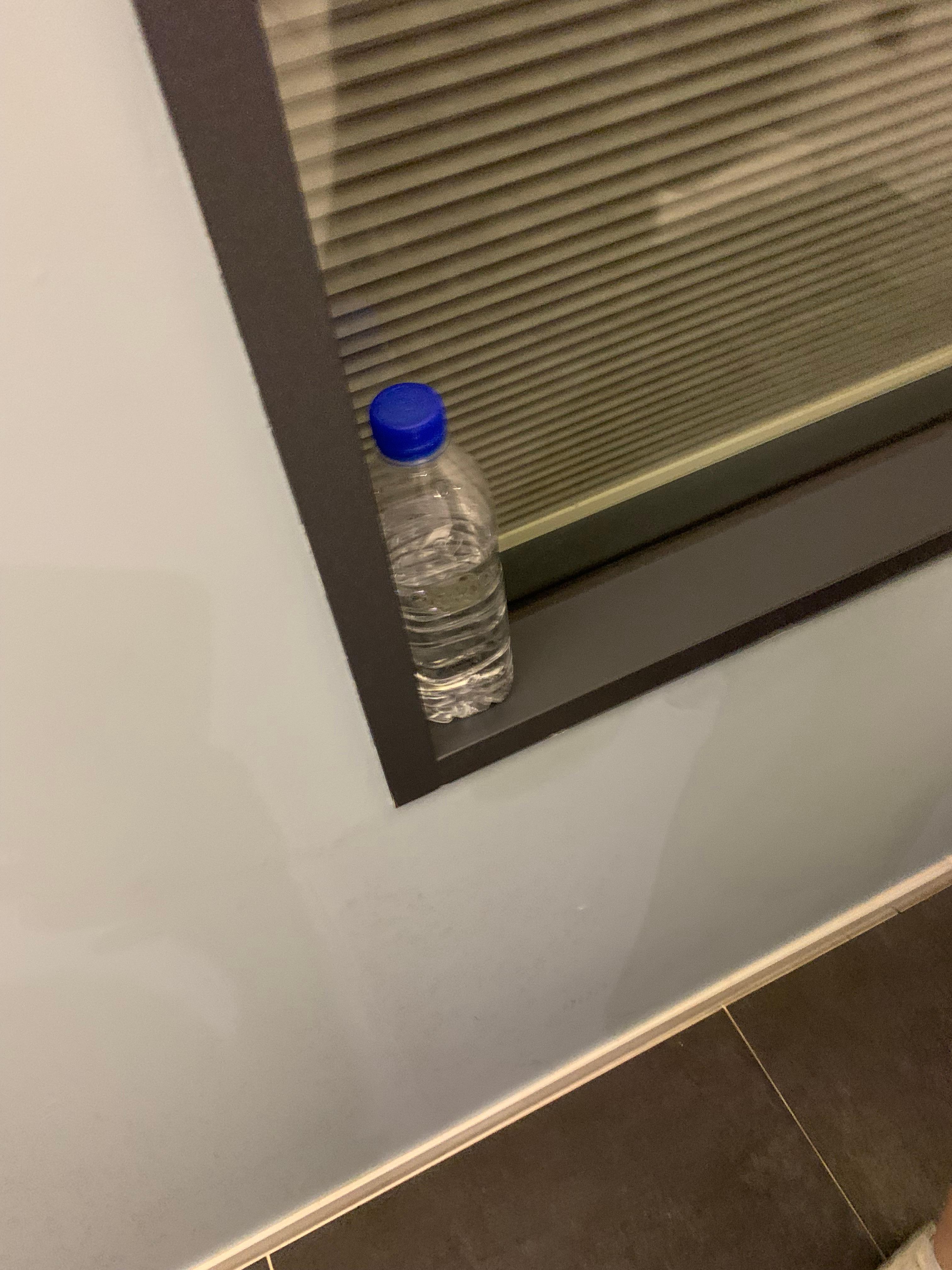 Half empty water bottle not cleaned