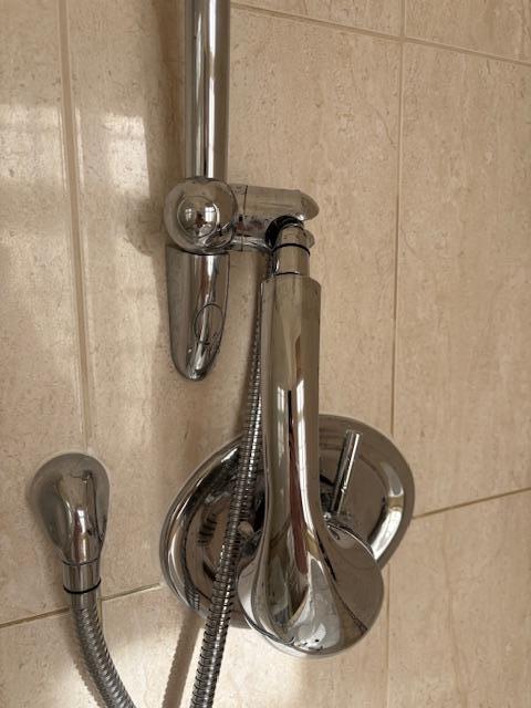 Shower does not stay in a fixed position