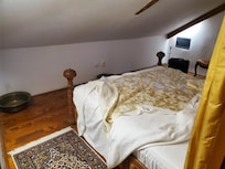 Tucked under the roof, you cannot walk far, but it's cosy.
