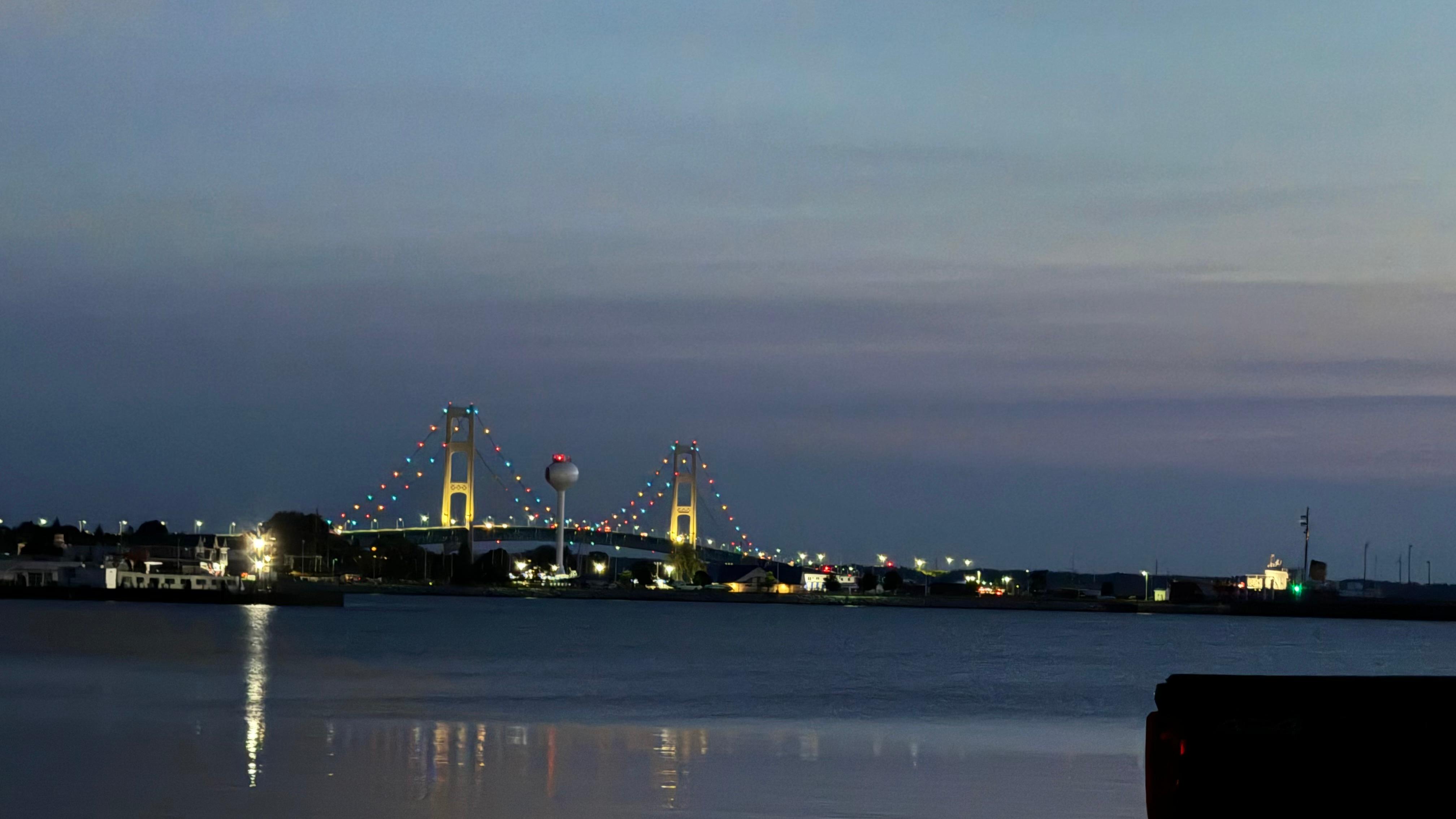 The bridge lit up across the lake