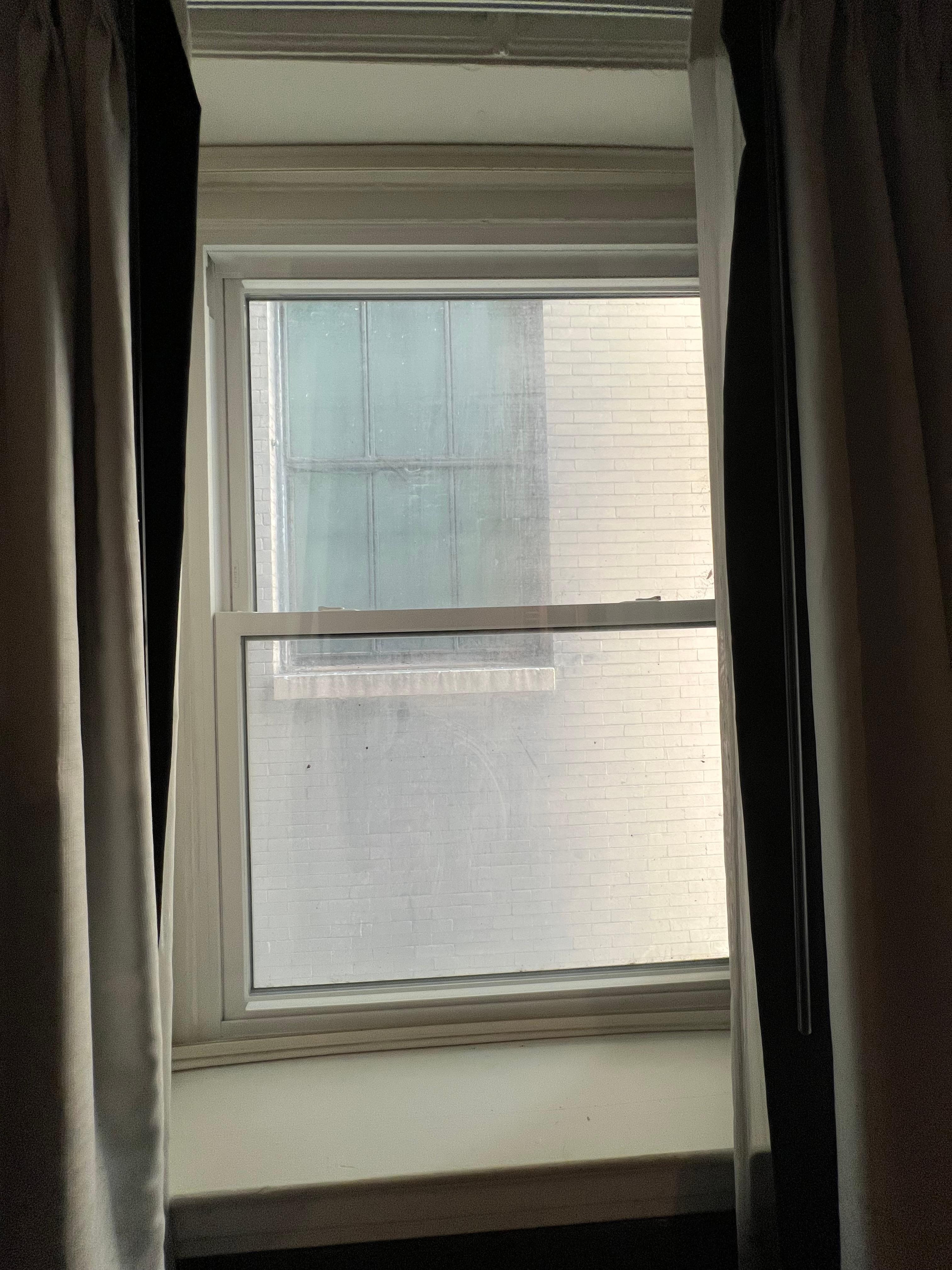 The only window in the whole space. Not much of a view either.