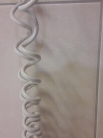 Poussière sur fil du sèche cheveux