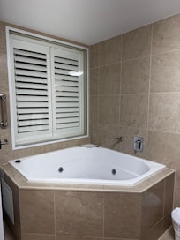 Spa bath in main bedroom