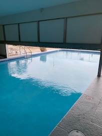 Indoor pool half under cover and half outside was heated