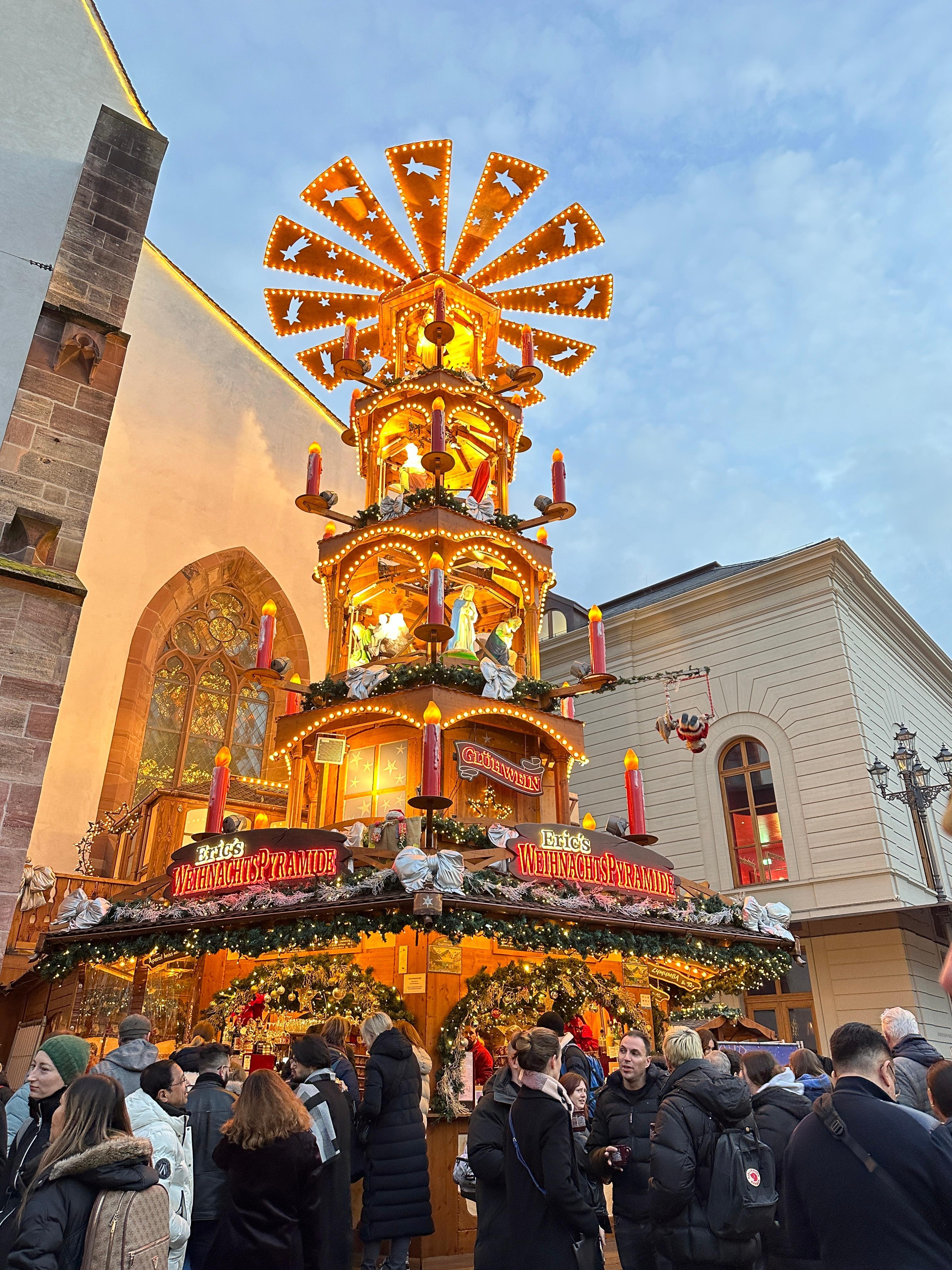 Christmas market stall close to hotel entrance 