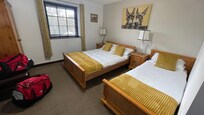 Room 1 - At top of external metal staircase accessed from beer garden. Slippery steps when wet. Room cold on arrival at took a while to heat, but cosy once warmed up.