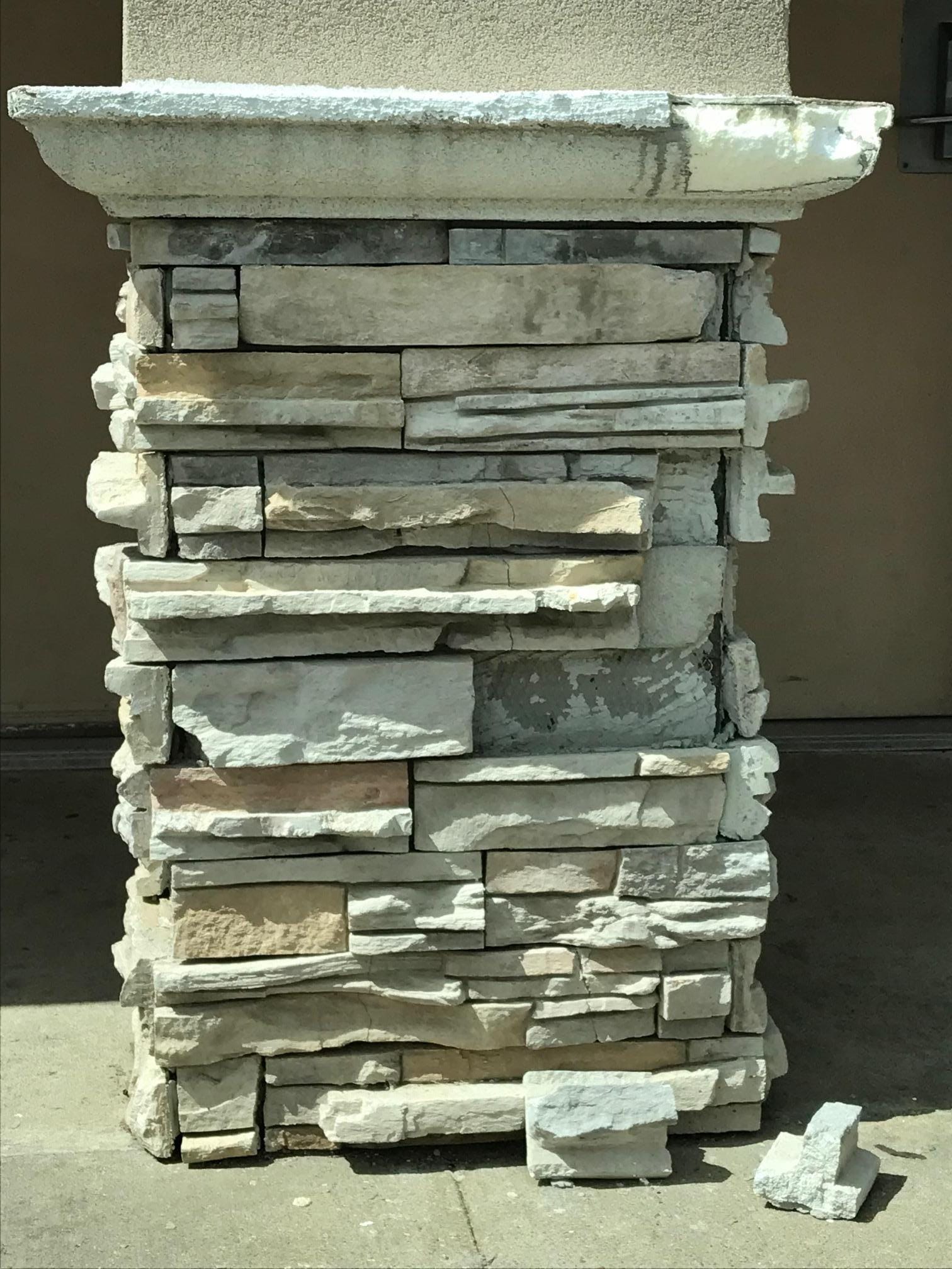 Column with stone falling off